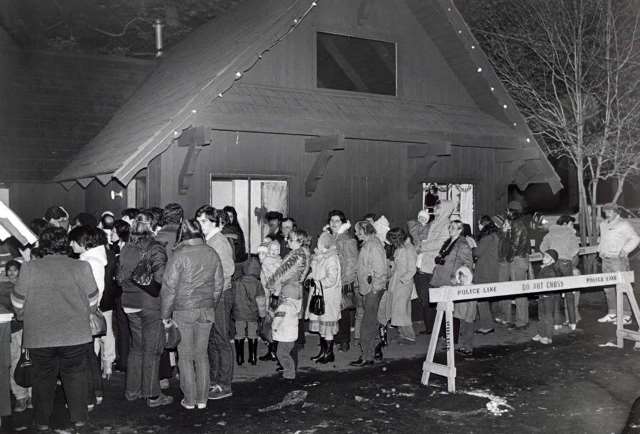 Crowds wait in line to enter the PAL Christmas Village_ in Bridgeport_ Conn. in December_ 1982. The Christmas Village reopened just days after being damaged by a fire on Dec. 7th.